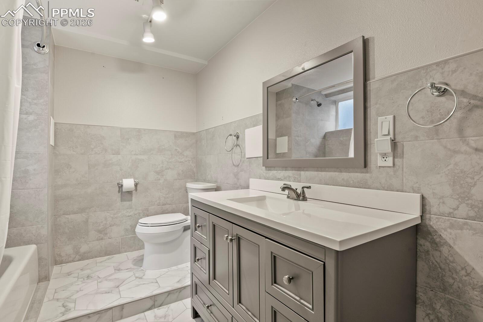 Full bathroom located in the basement