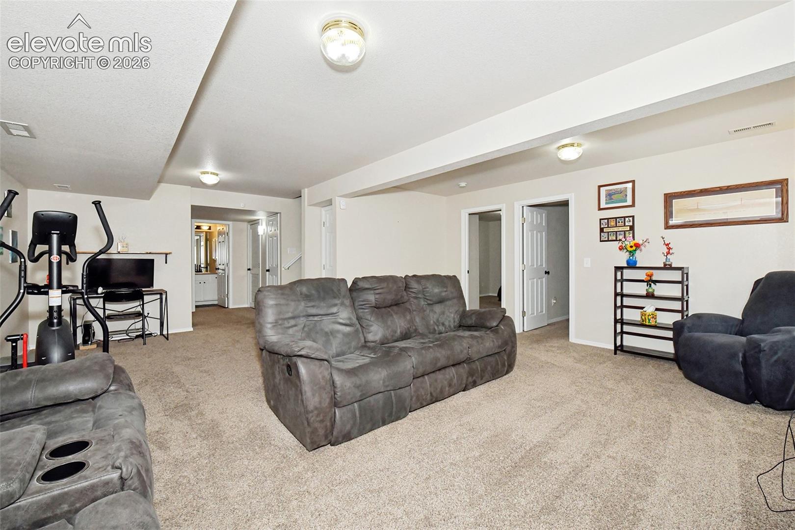 Large family room in basement.