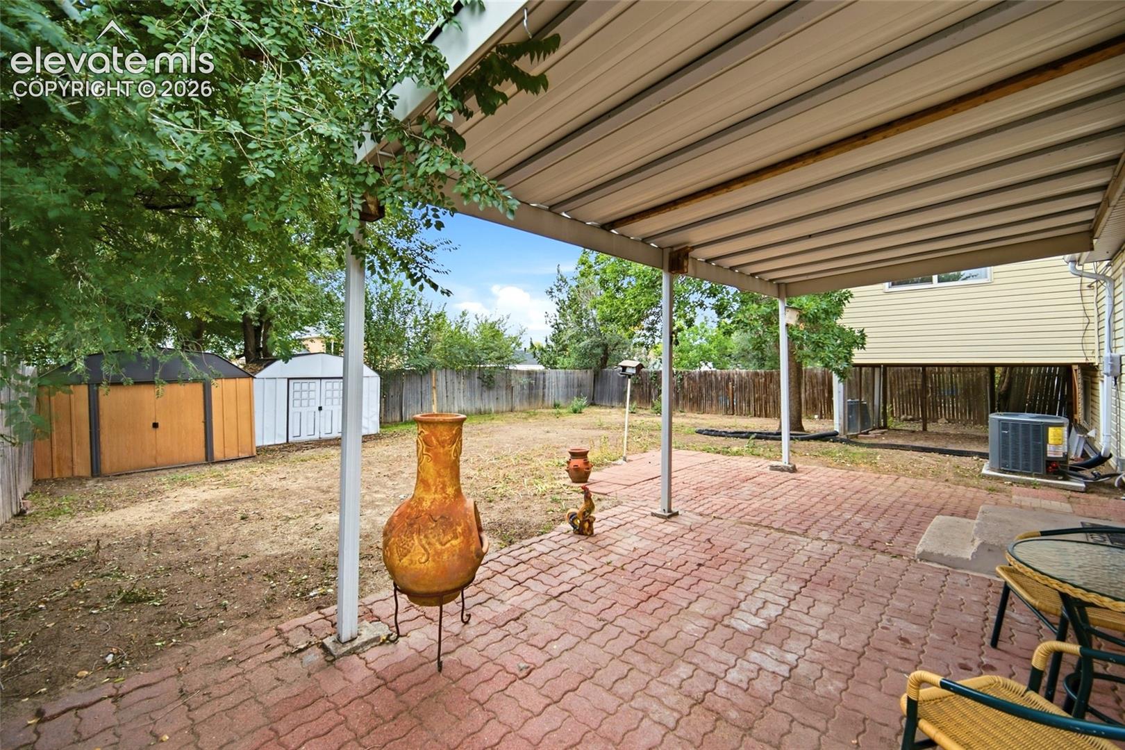Covered Patio and Off the kitchen for your BBQ's!