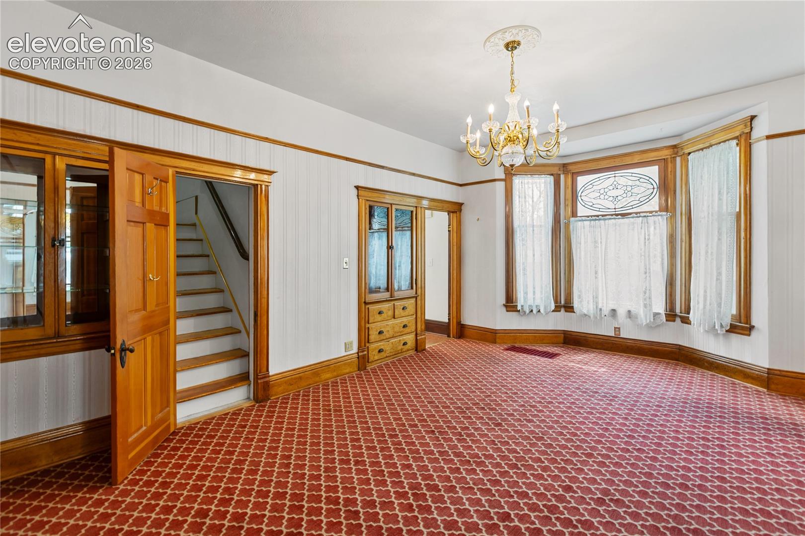 Main level stairwell to upper apartment