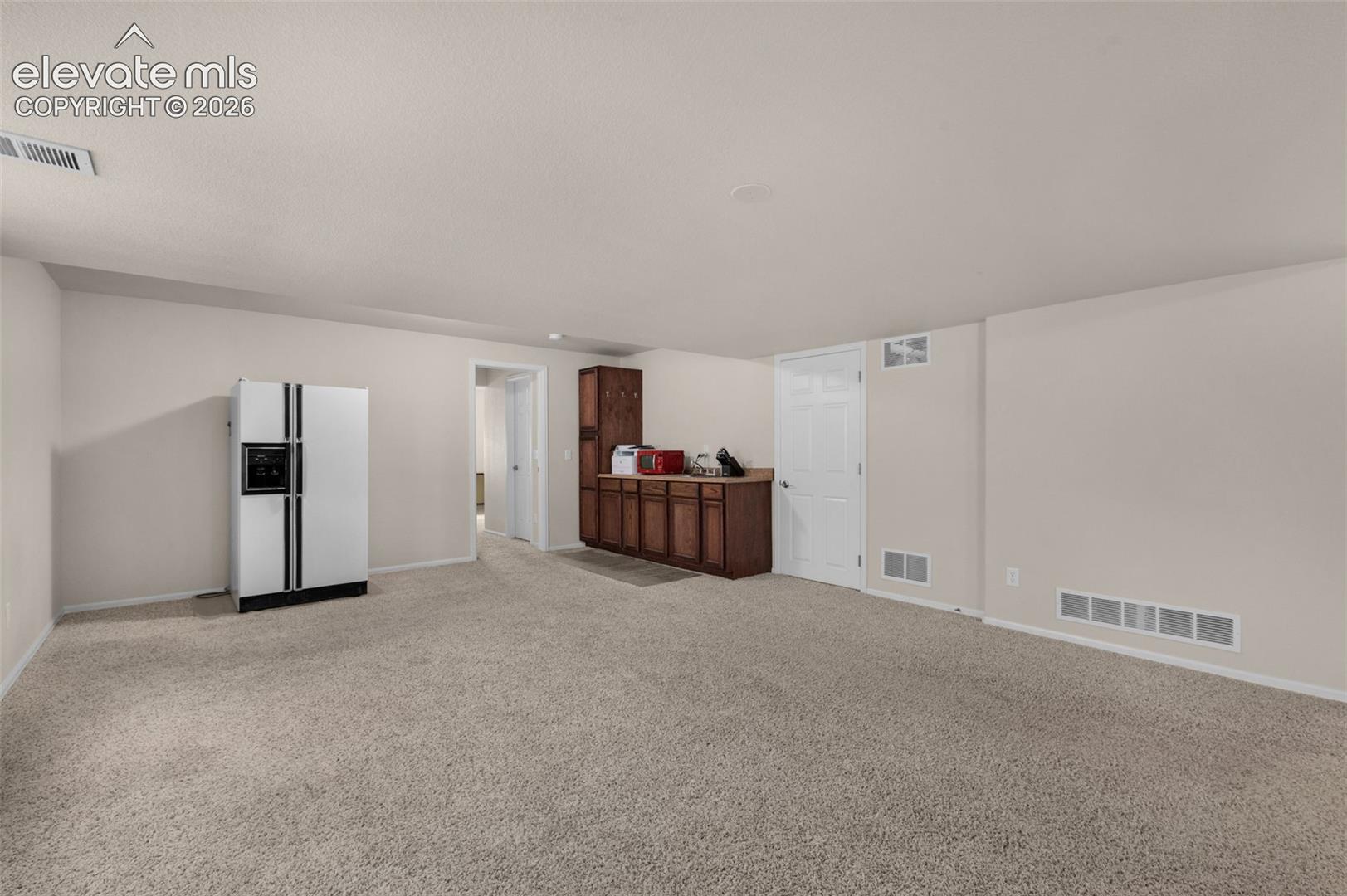 Kitchenet in the basement. 