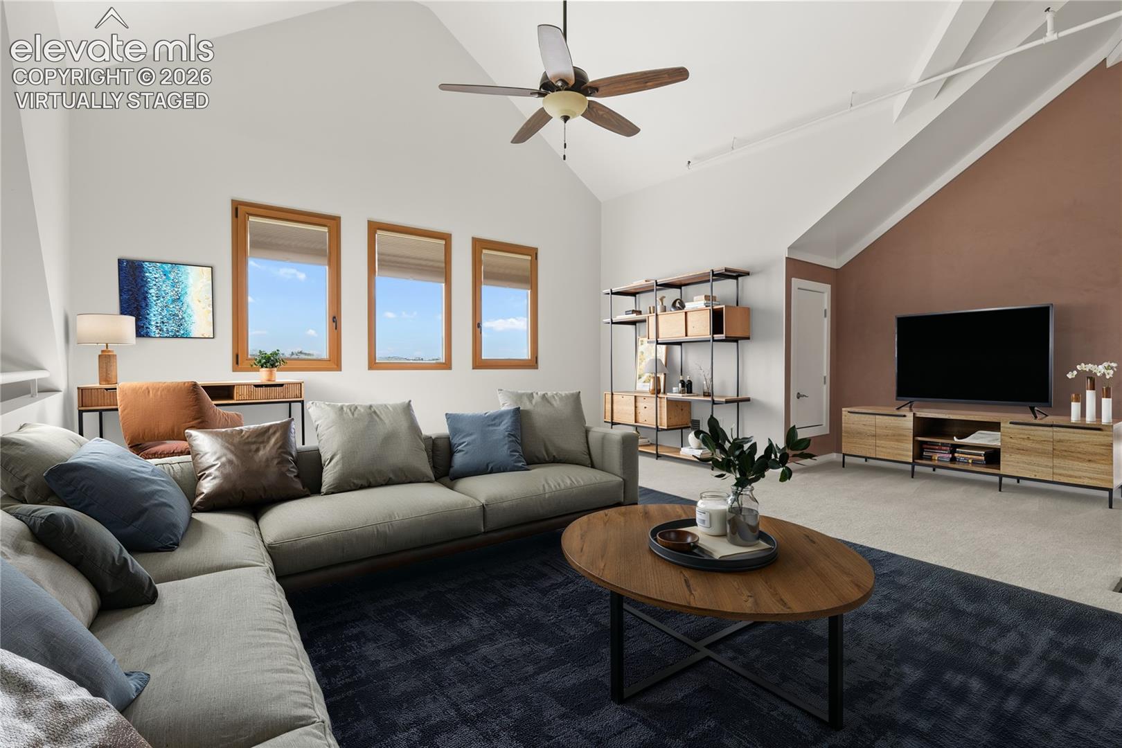 Lofted level introduces a second living zone—well-suited for a secondary suite, studio, or media space. Virtually Staged