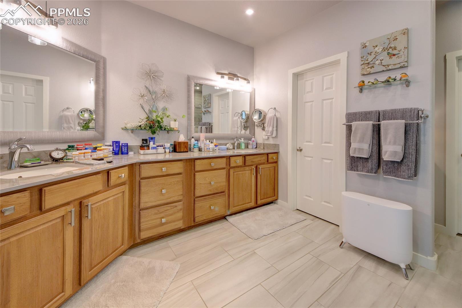 Master bath quartz counters, floating shelves and mirrors, and a coffee bar