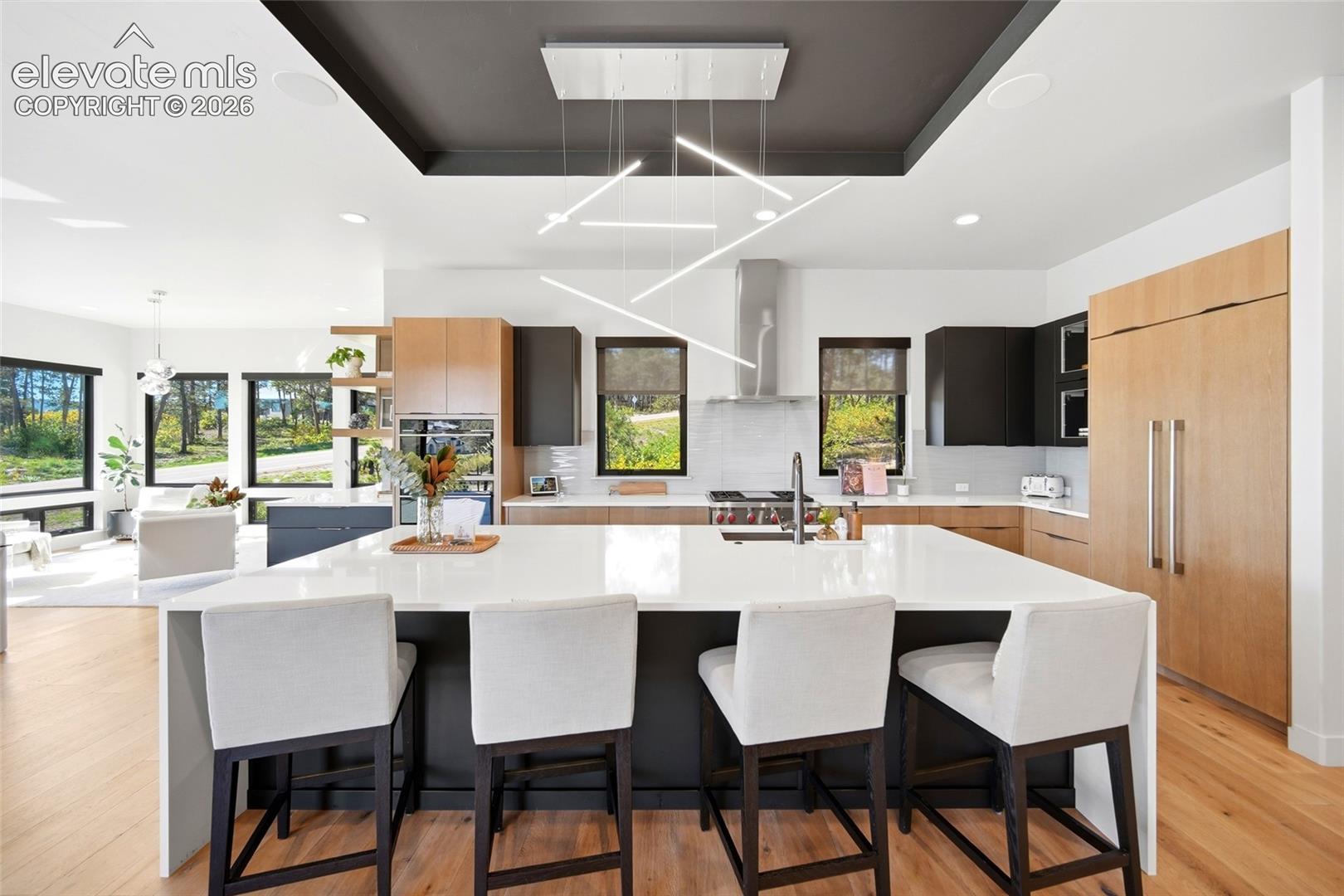 Expansive kitchen island with a white countertop
