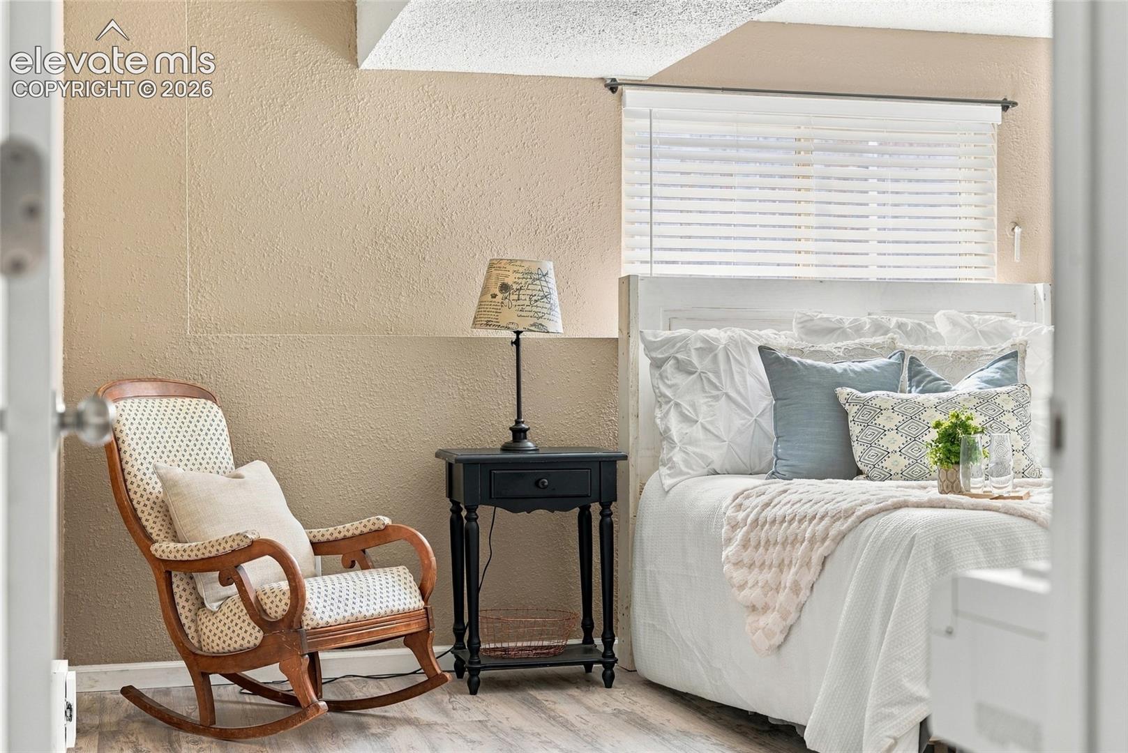 Wood-finish flooring with a textured wall finish