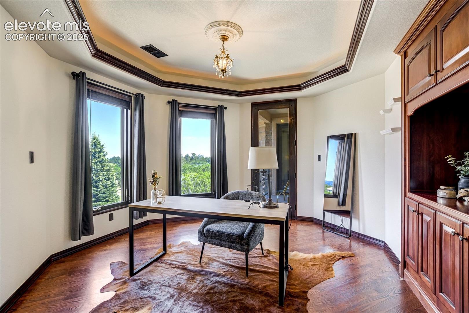 Attached office with balcony access. 