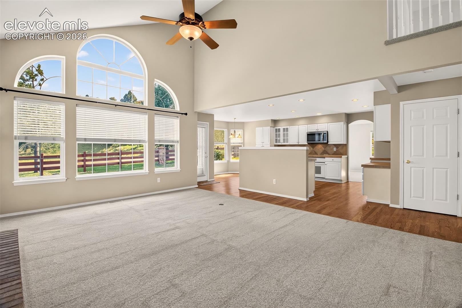 Family Room Looking Into The Kitchen, Ceiling Fan and Central A/C