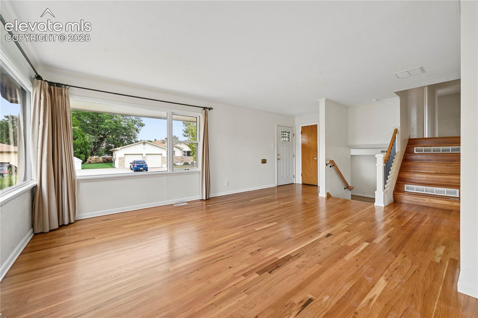Living Room (Looking Towards Entry & Stairs)