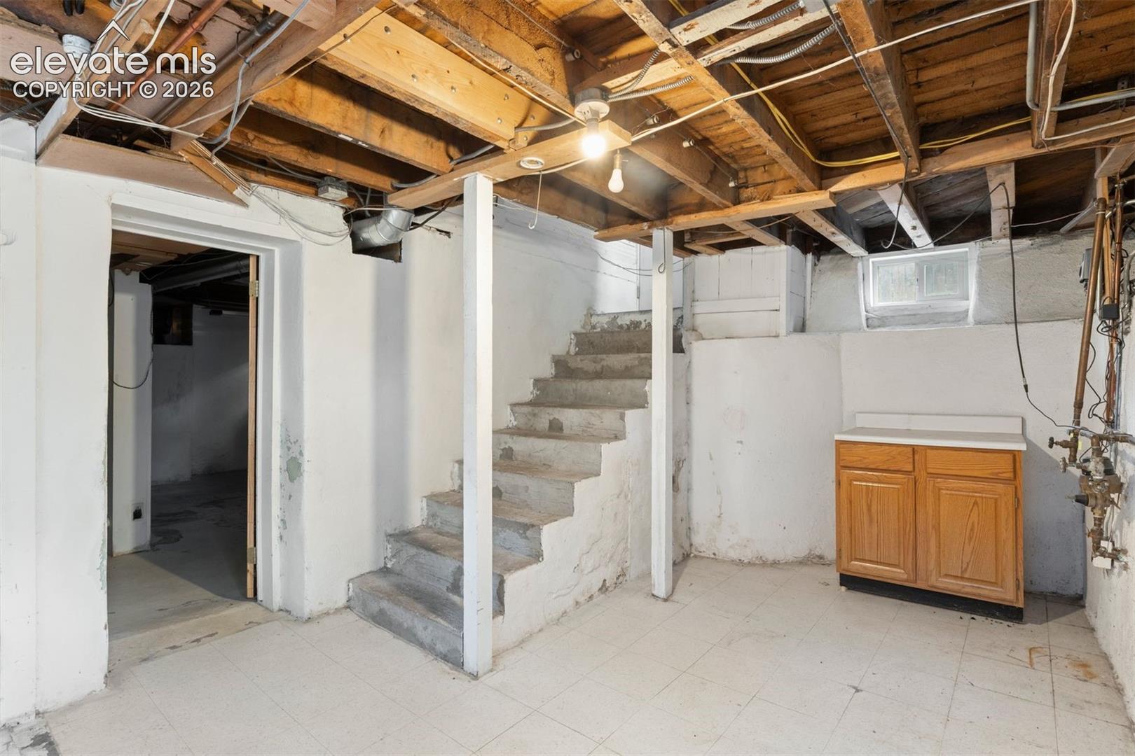 Unfinished basement/laundry area