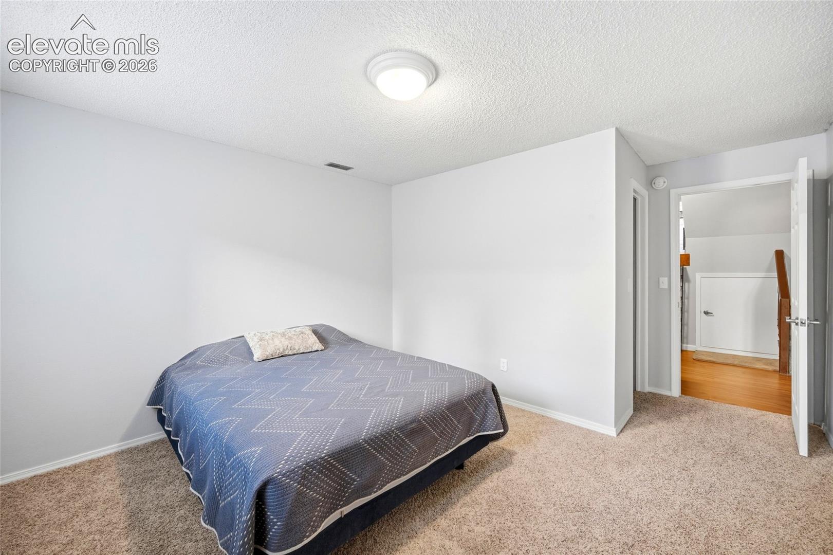 LOWER LEVEL BEDROOM.