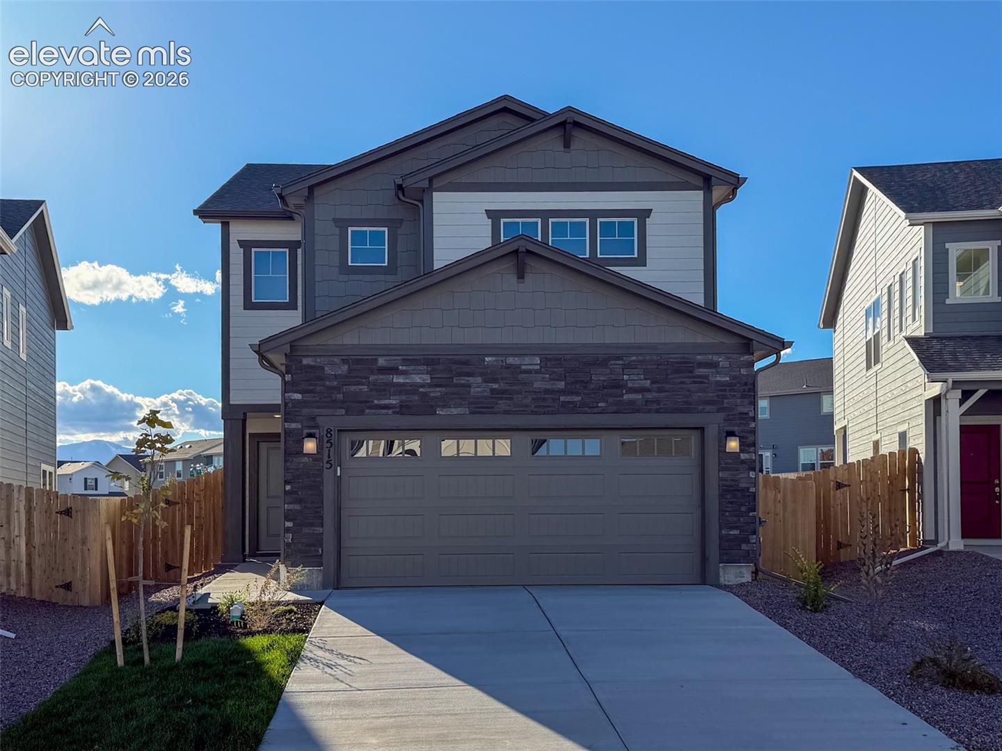 Set on a desirable homesite backing to open space, this Rio offers a little more breathing room and a setting that stands out. Located in Sterling Ridge within Academy District 20, this home features a fully landscaped and fenced yard, with a neighborhood park just a short walk away.Inside, the open-concept main level is designed for easy everyday living, seamlessly connecting the kitchen, dining area, and great room into one bright, inviting space. Luxury vinyl plank flooring flows throughout the main living areas, while a beautiful electric fireplace creates a warm and welcoming focal point. The kitchen features quartz countertops, stainless steel appliances, and plenty of space for cooking, gathering, and entertaining.Upstairs, a spacious loft provides a versatile second living area perfect for a home office, media room, playroom, or workout space. Two secondary bedrooms accompany the generous primary suite, complete with a walk-in closet, dual sinks, and an oversized tiled shower with a built-in bench. Convenient upstairs laundry adds to the home's thoughtful, functional design.Outside is where this home really shines! Backing to open space, the homesite offers an inviting outdoor setting with no immediate rear neighbors. Full landscaping, irrigation, and privacy fencing are already included, allowing you to enjoy your outdoor space right away. Central air and smart home features, including a smart thermostat and garage door openers, add everyday comfort and convenience. A video doorbell is also included and will be installed after closing.Sterling Ridge offers a community lifestyle with a dog park, pickleball courts, soccer fields, neighborhood parks, walking trails, and an amphitheater, along with convenient access to shopping, dining, and everyday essentials. Built by Challenger Homes, a local Colorado Springs builder with more than 25 years of experience, this home also includes an in-house 1-2-10 warranty program for added peace of mind.