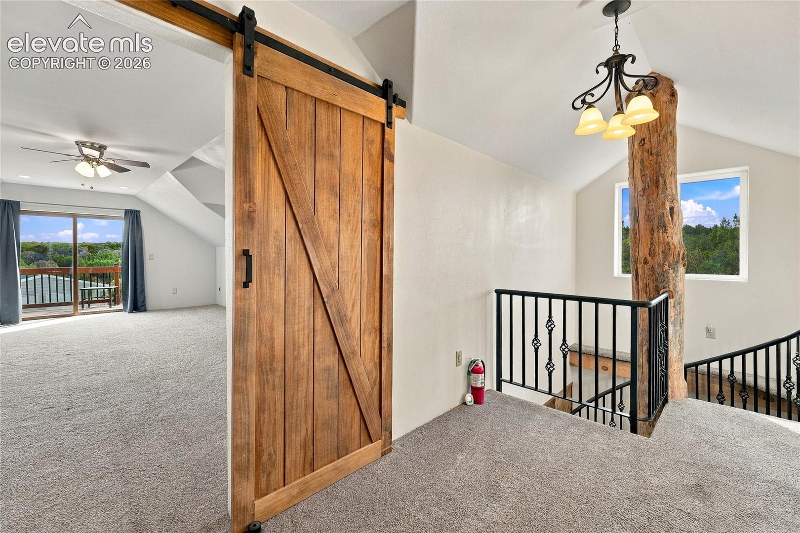 Upstairs hallway with custom barn doors