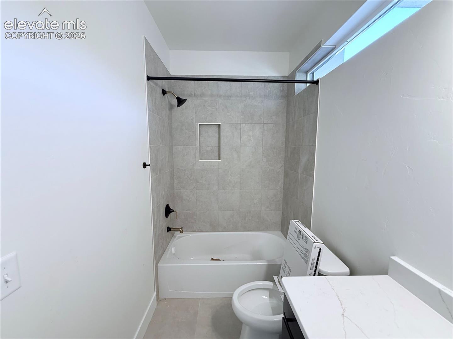 Bath 2 located inside Bedroom 2