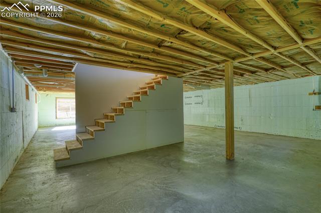 Below grade area featuring stairs