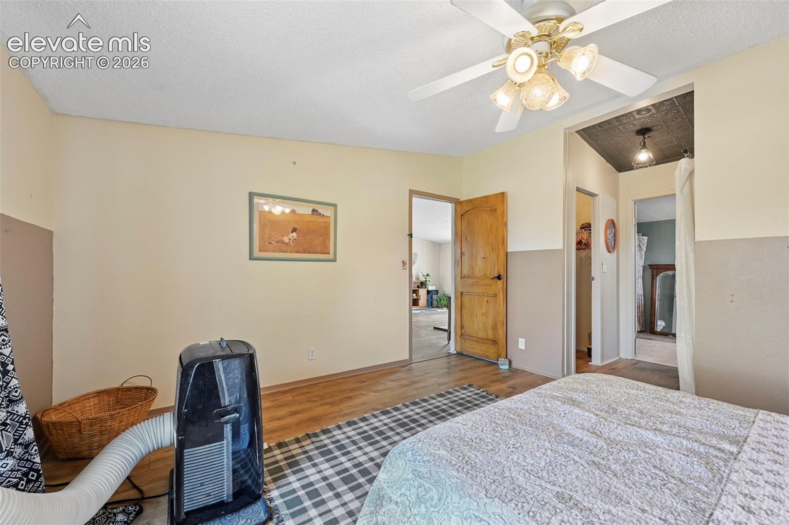 Floorplan offers 3 bedrooms with primary on North side and secondary bedrooms on south side.