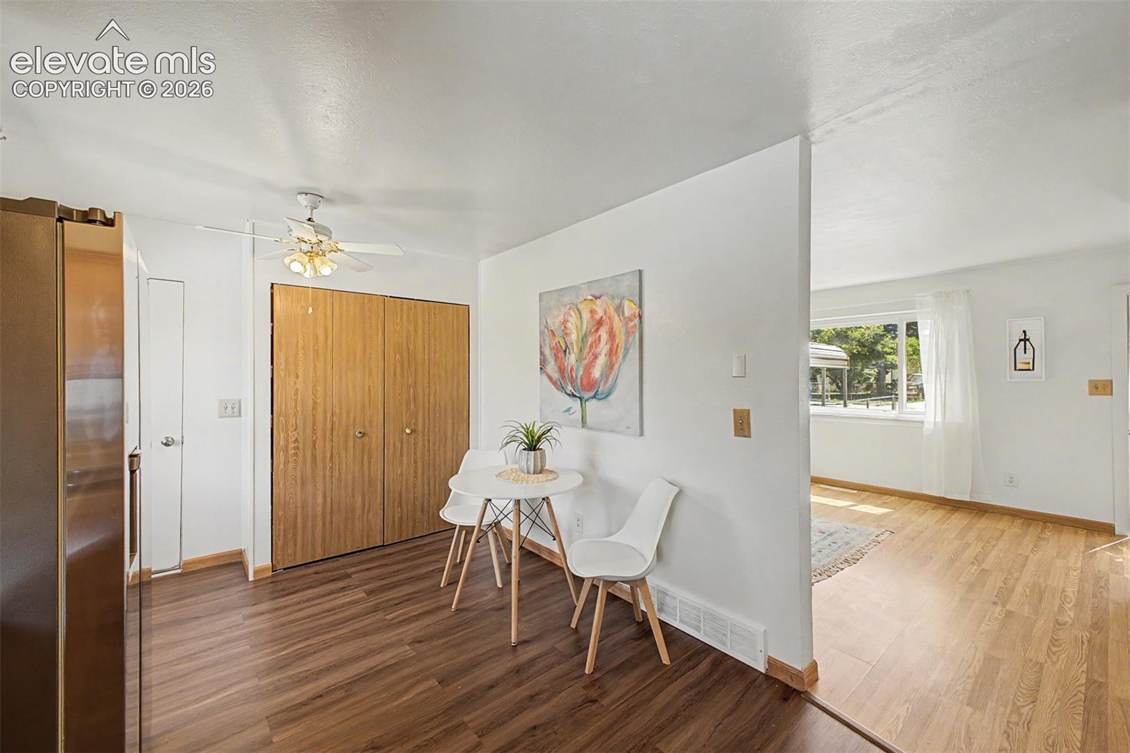 Eat-in kitchen. a large pantry and side door to the back yard. 