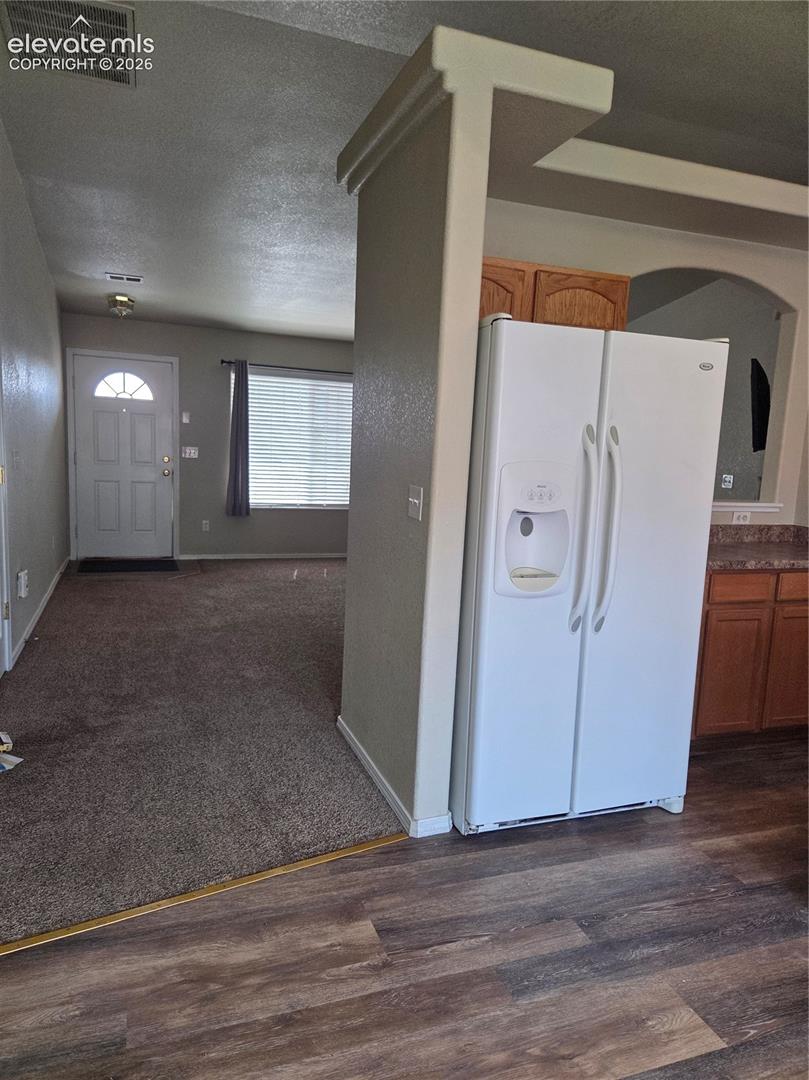 looking from dining room into living room.