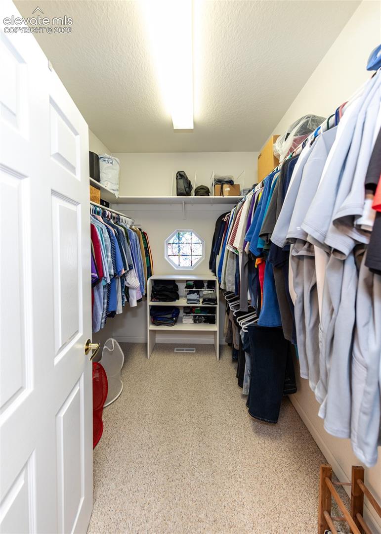 Primary Bedroom Walk in Closet