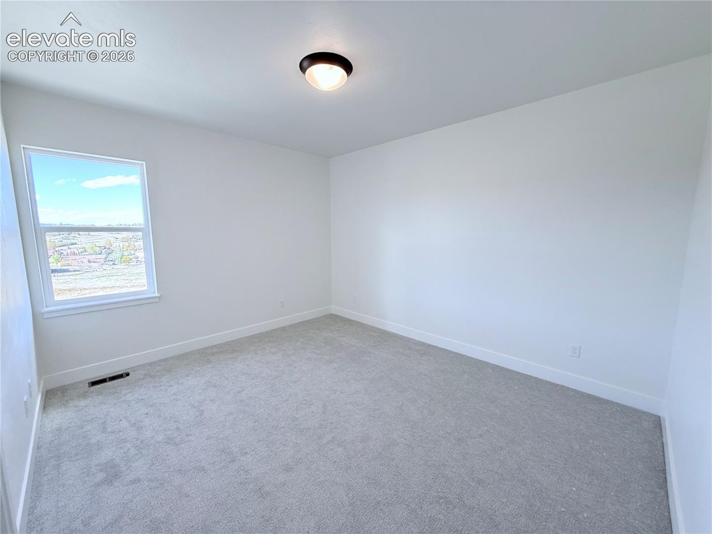 Bedroom 2 is a Jr. Suite with Private Full Bath located on the Main Level