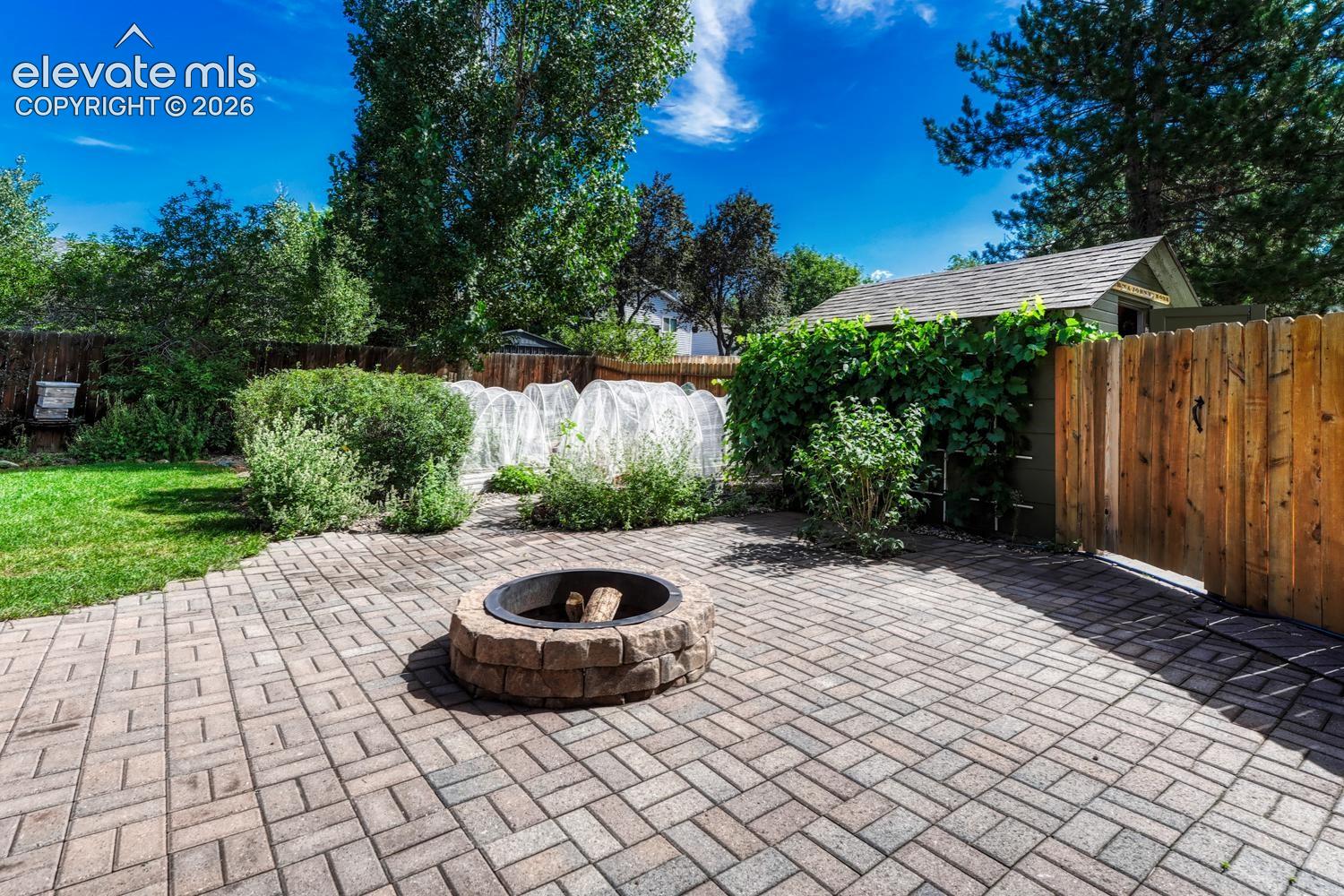 Paver patio with firepit.