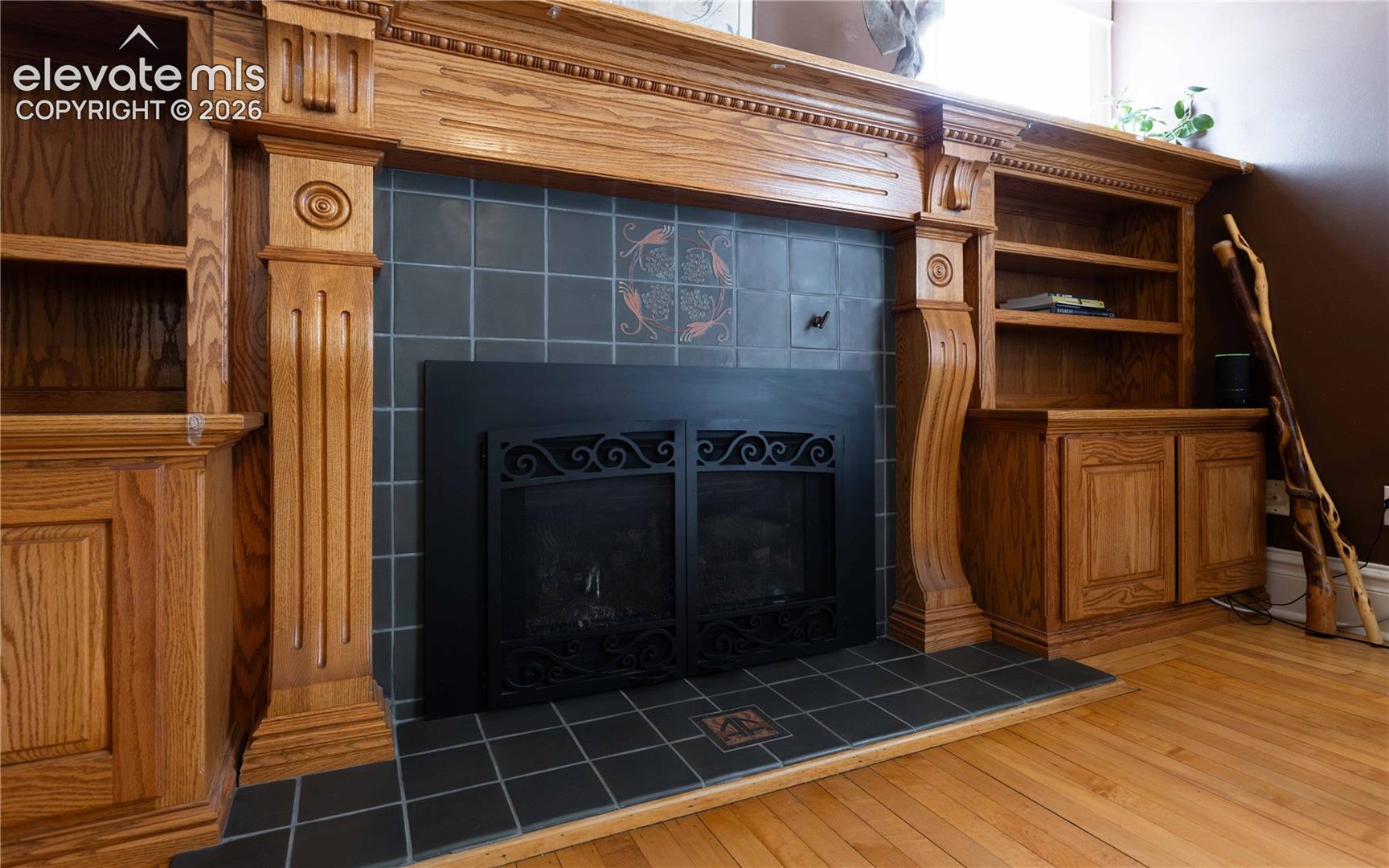 Custom built fireplace inlaid with Van Briggle tile