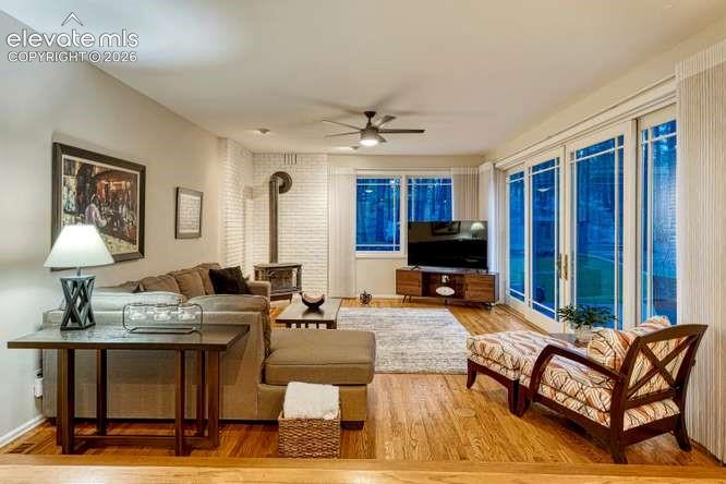 Family room off kitchen with cozy gas stove and bi-parting sliding glass door that walks out to the expanded deck
