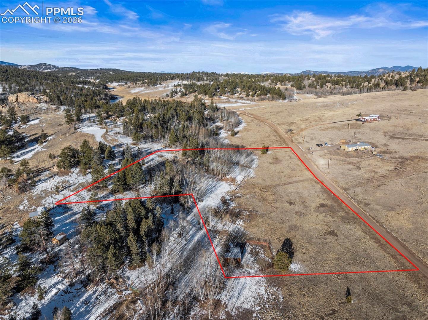 Overview of rural landscape with mountains and property boundaries highlighted. Property Lines are Approximate and not a survey.