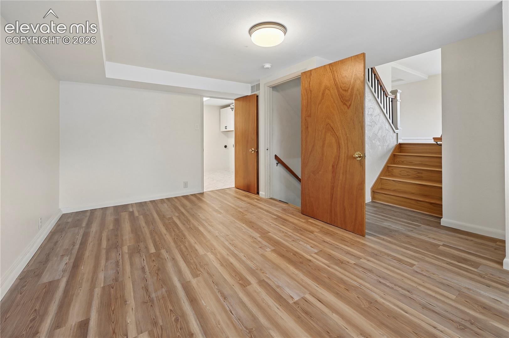 Lower Level Family Room (Looking Towards Stairs & Laundry)