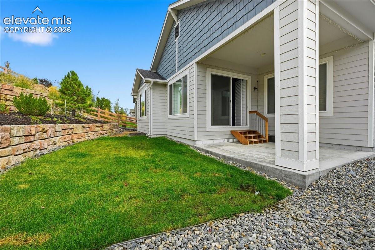 Wonderful intimate back yard with covered patio!
