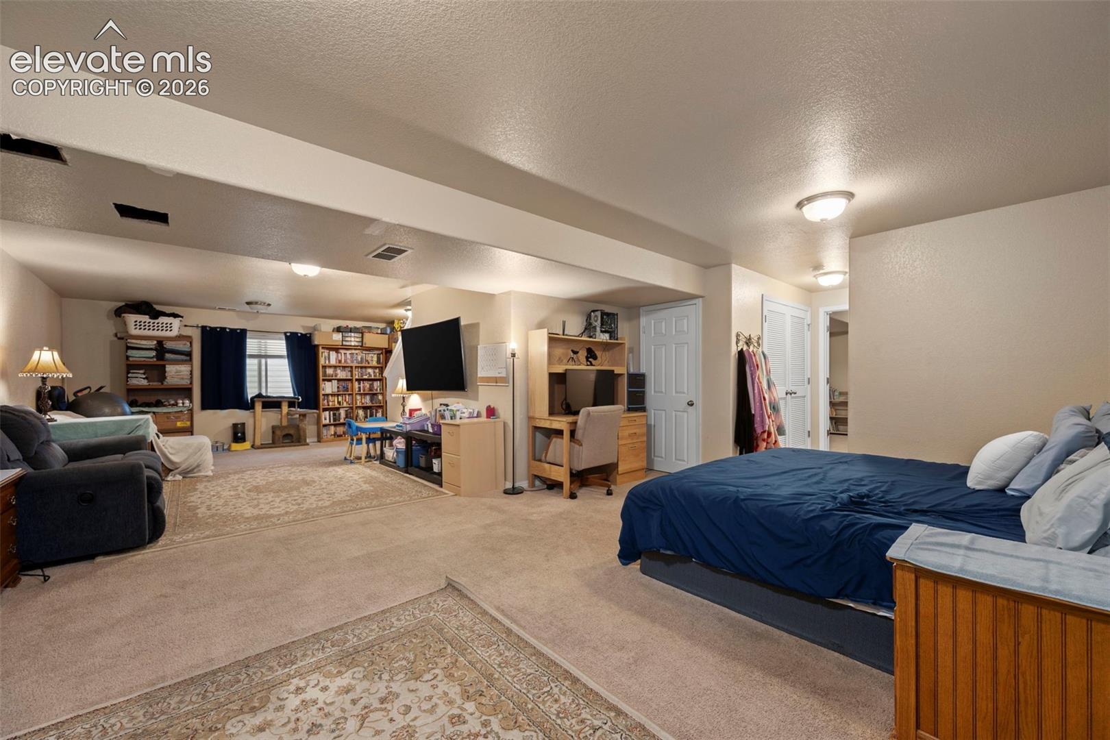 Offset of family room currently being used as a bedroom. Versatile in uses to meet your needs. 