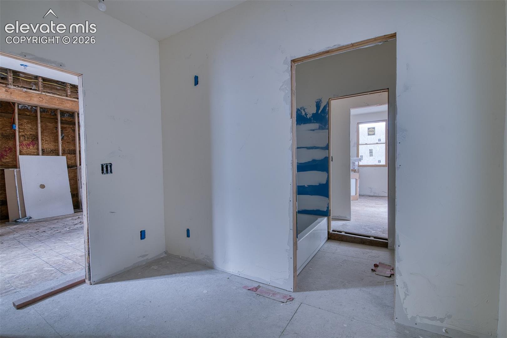 Bedroom #2 off the dining area. Jack and Jill bathroom connects the two main level bedrooms