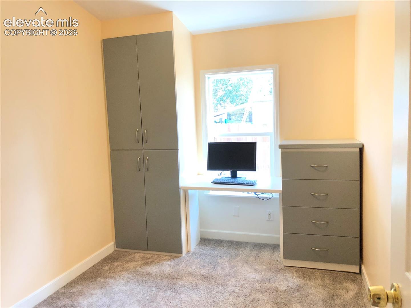 Third bedroom / home office. Built-In Drawers, natural light window.