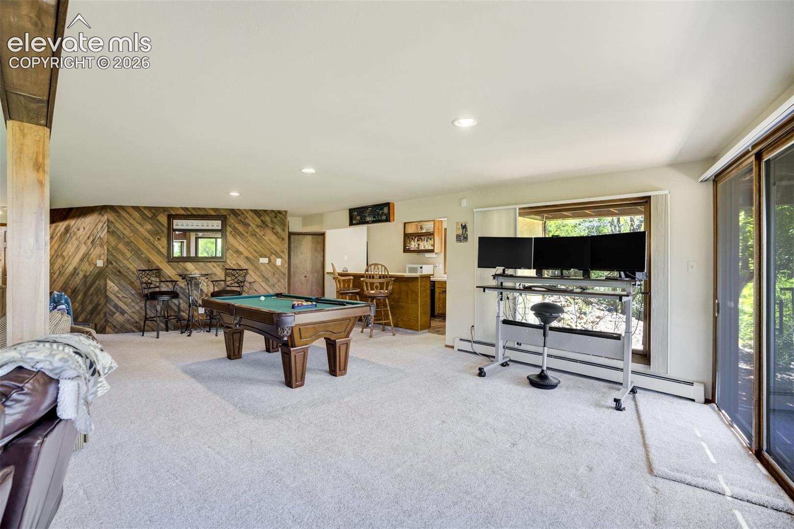 Billards area of Family Room with wet bar.