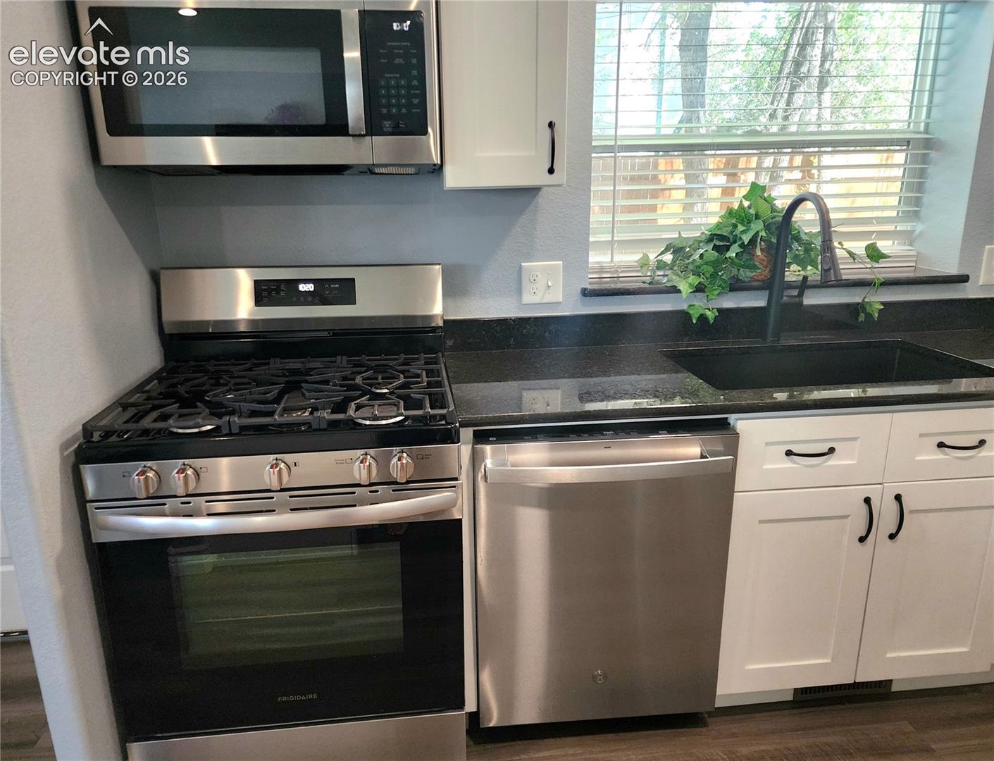 High-end gas range and dishwasher combo ready for your culinary adventures