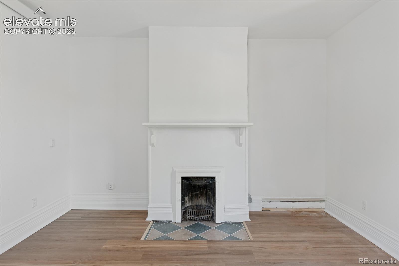 Main-level flat primary
suite features a
fireplace