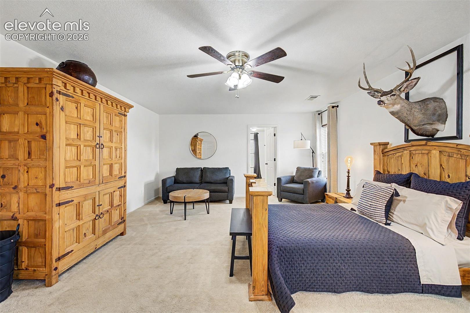 The primary suite flows naturally toward a dedicated en suite, and its generous square footage and soft neutral tones create a calm, hotel-like atmosphere that ends and begins every day on a high note.