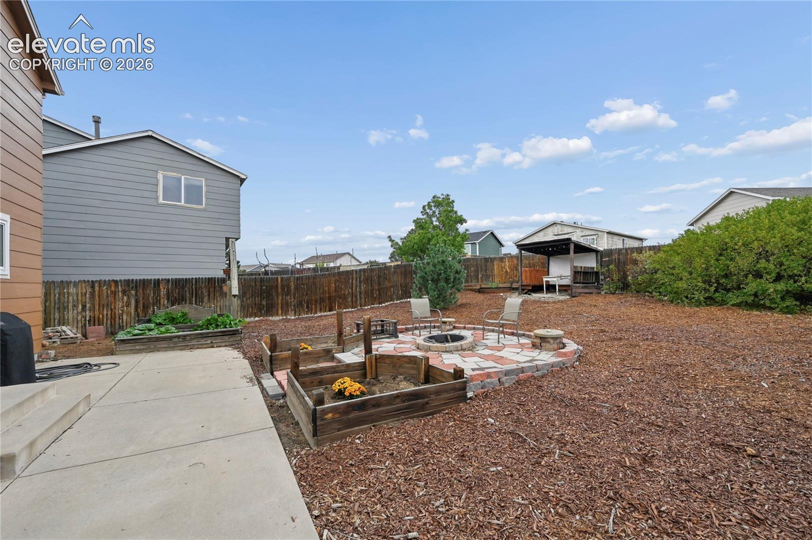 Lots of patio space and a firepit area outside the dining room