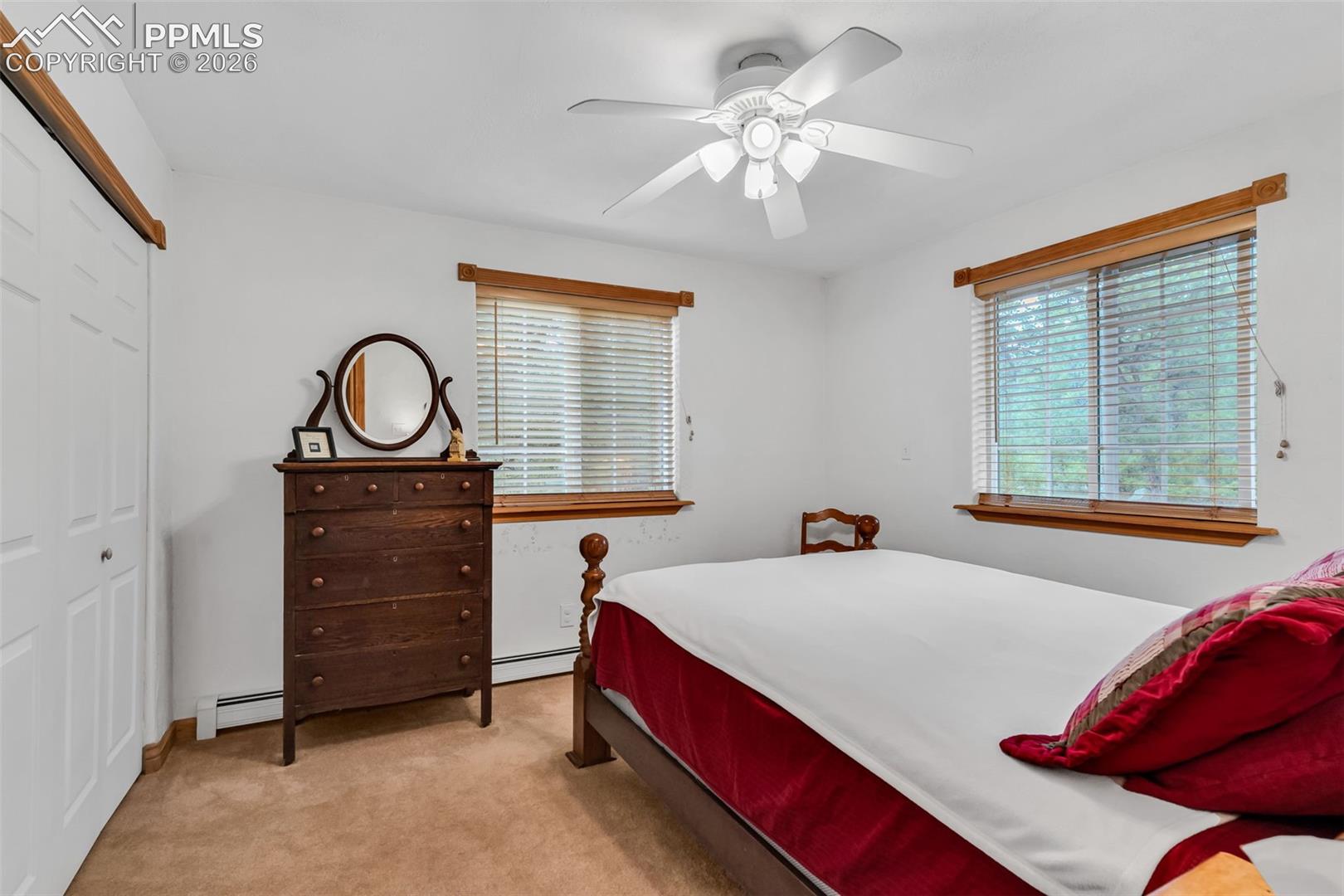 Third Main level bedroom with electric baseboard heating from solar panels