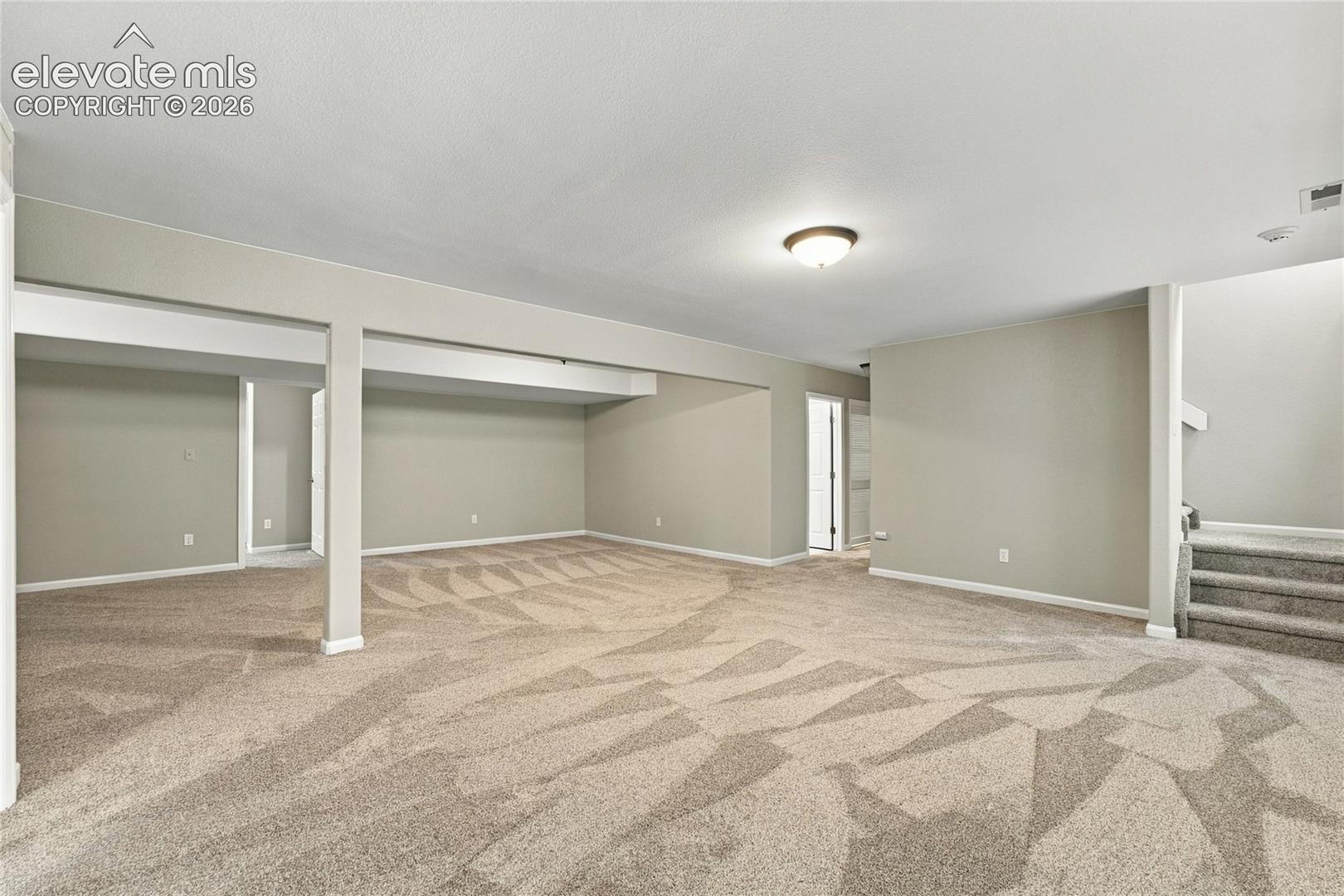 create separate living spaces in large recreation room