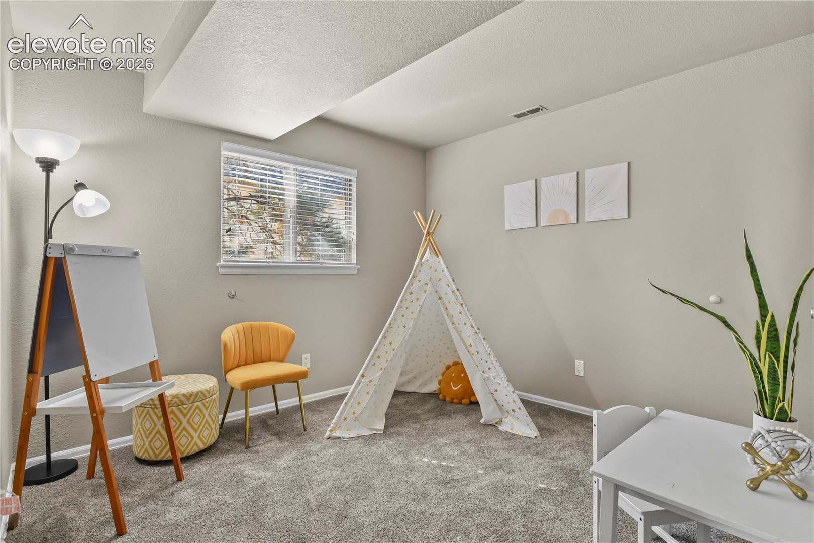 Office, bedroom or kids playroom, Neutral wall tones, wall-to-wall carpeting, and a double-pane window