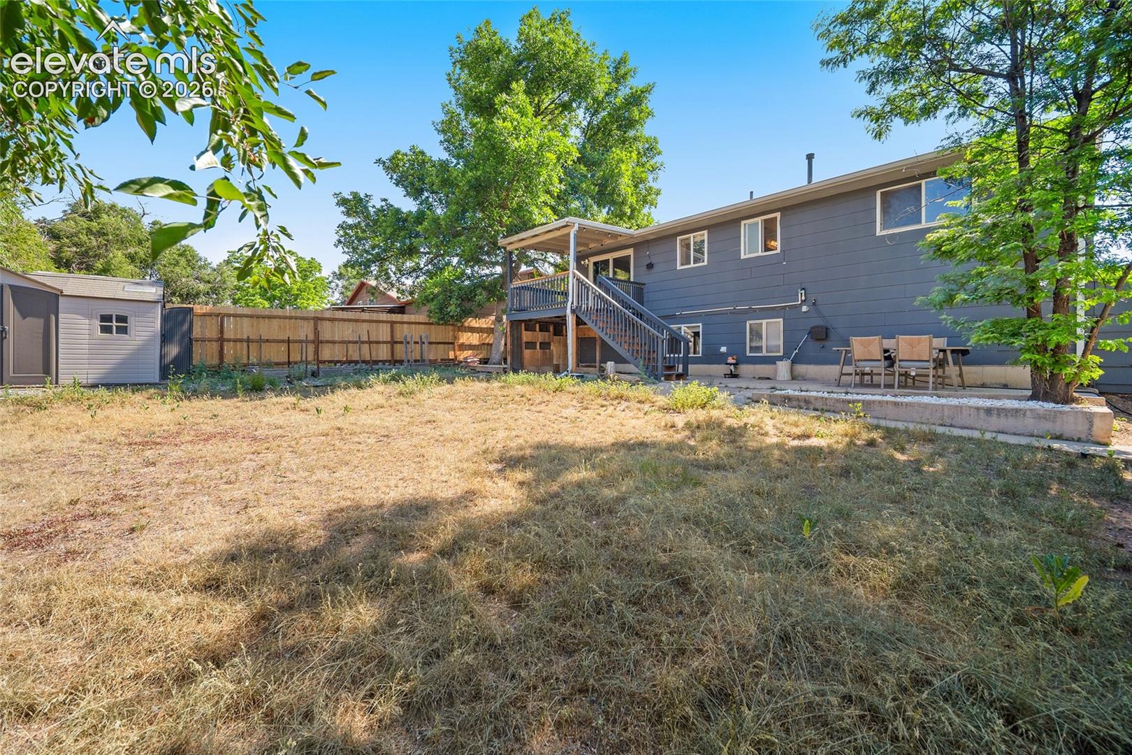 Spacious backyard viewing property.