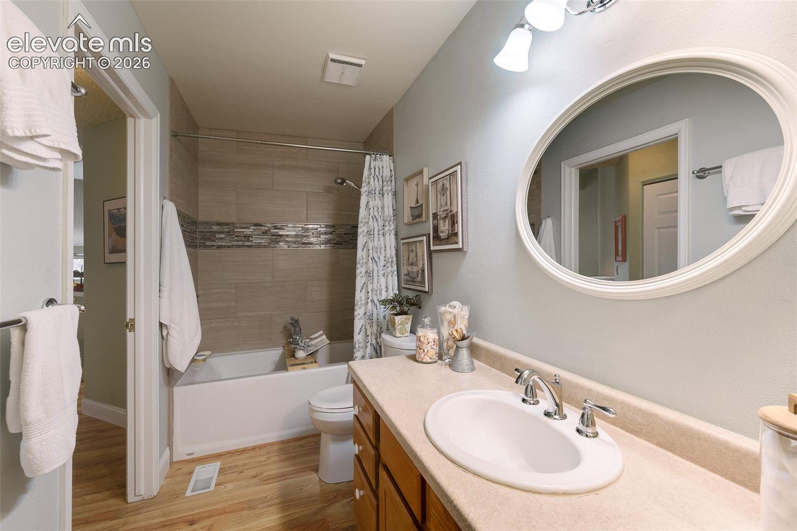 The Primary Bathroom has a private access from the Primary Bedroom