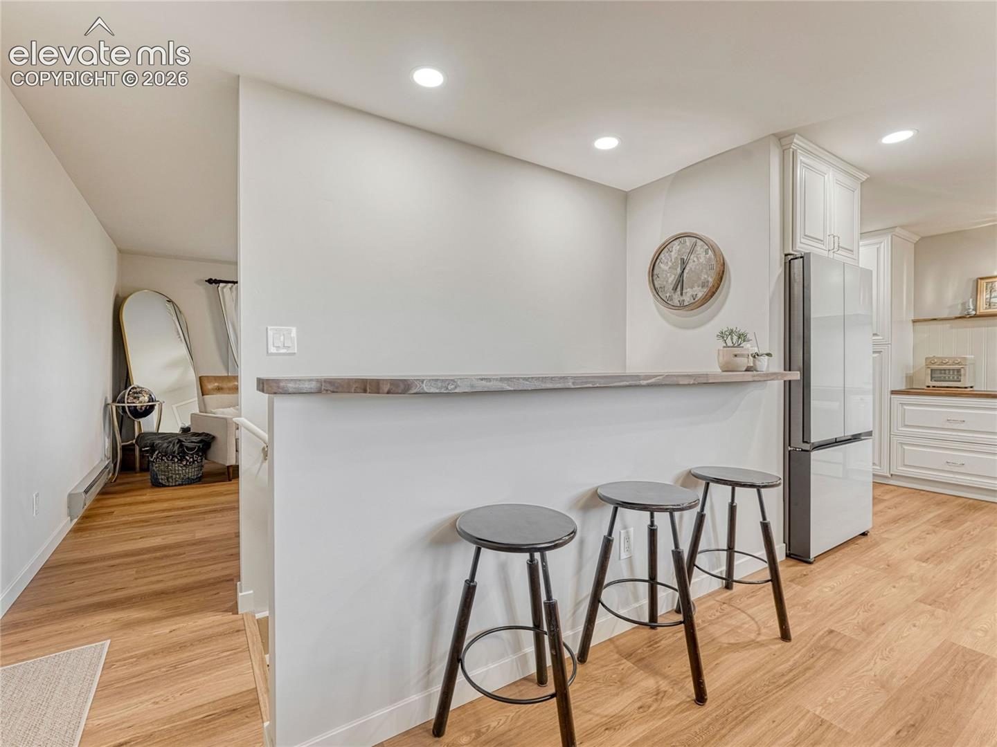 Breakfast bar wcustom wood countertop.