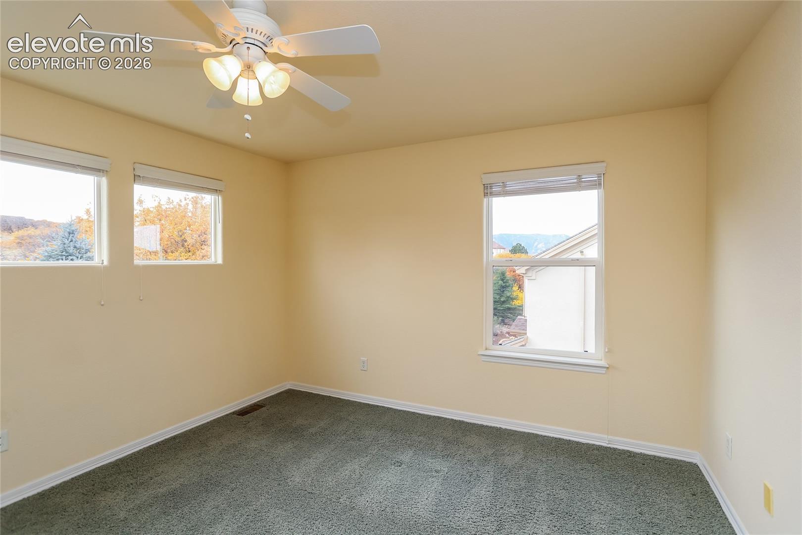 Bedroom 4 has mountain range views from the side window. 