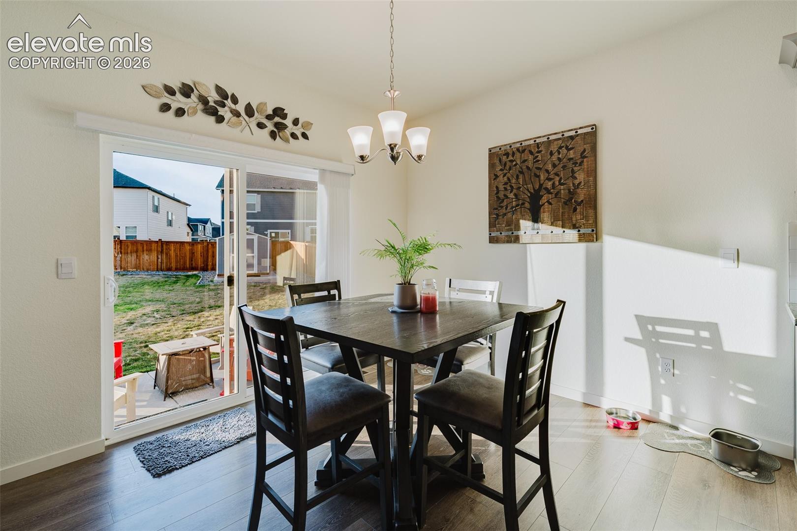Dining Nook for informal meals with a slider to the backyard patio.