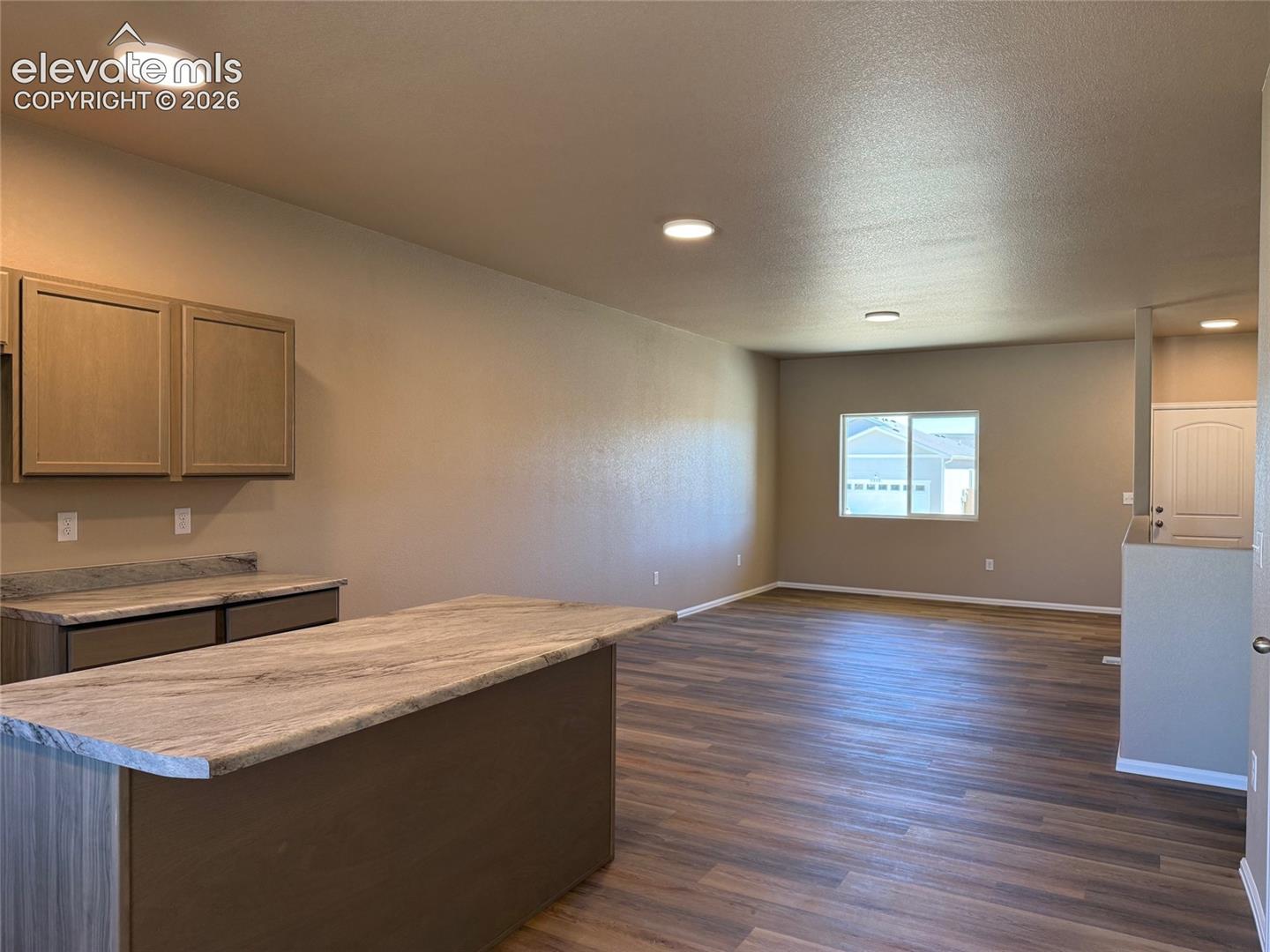 Kitchen island with stone-finish countertop