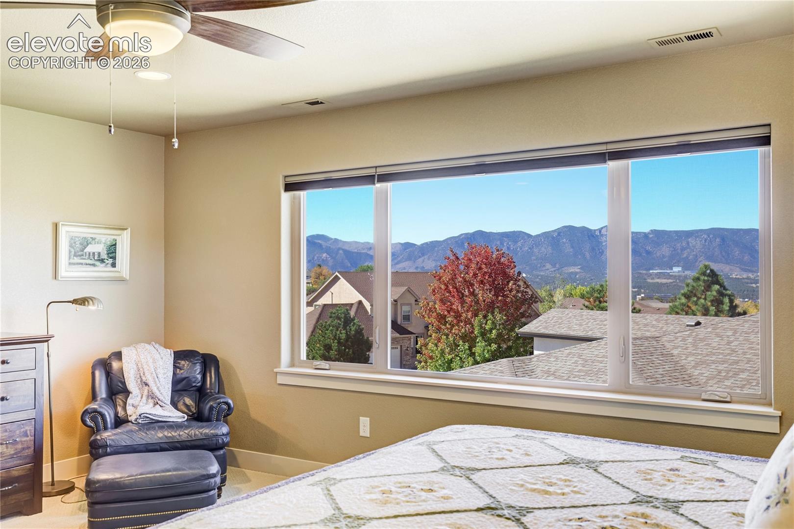 A remarkable picture window frames sweeping mountain vistas, bringing the beauty of Colorado directly into the primary suite. Enjoy a changing panorama of Pikes Peak + the Front Range from the comfort of your private retreat.