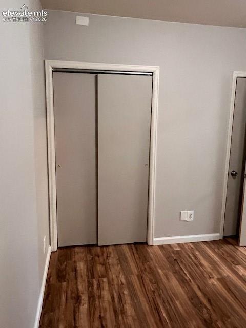 Wood-finish flooring, sliding closet doors, and interior doors with round hardware