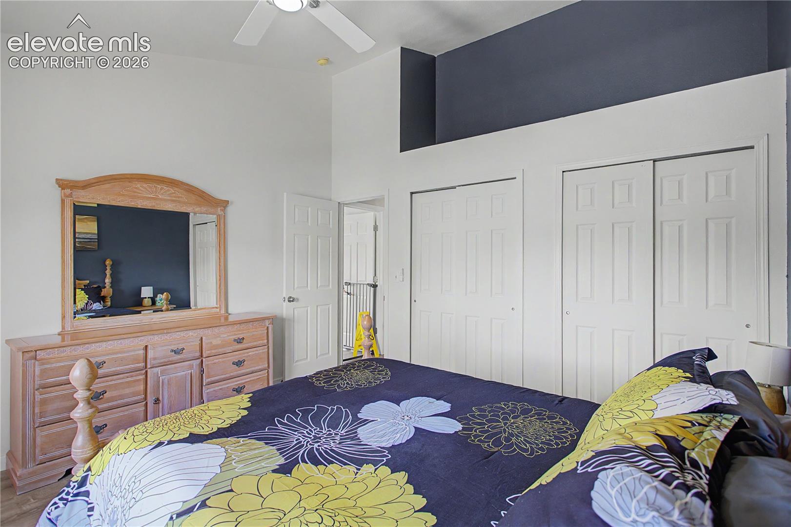 Another view of master with ceiling fan