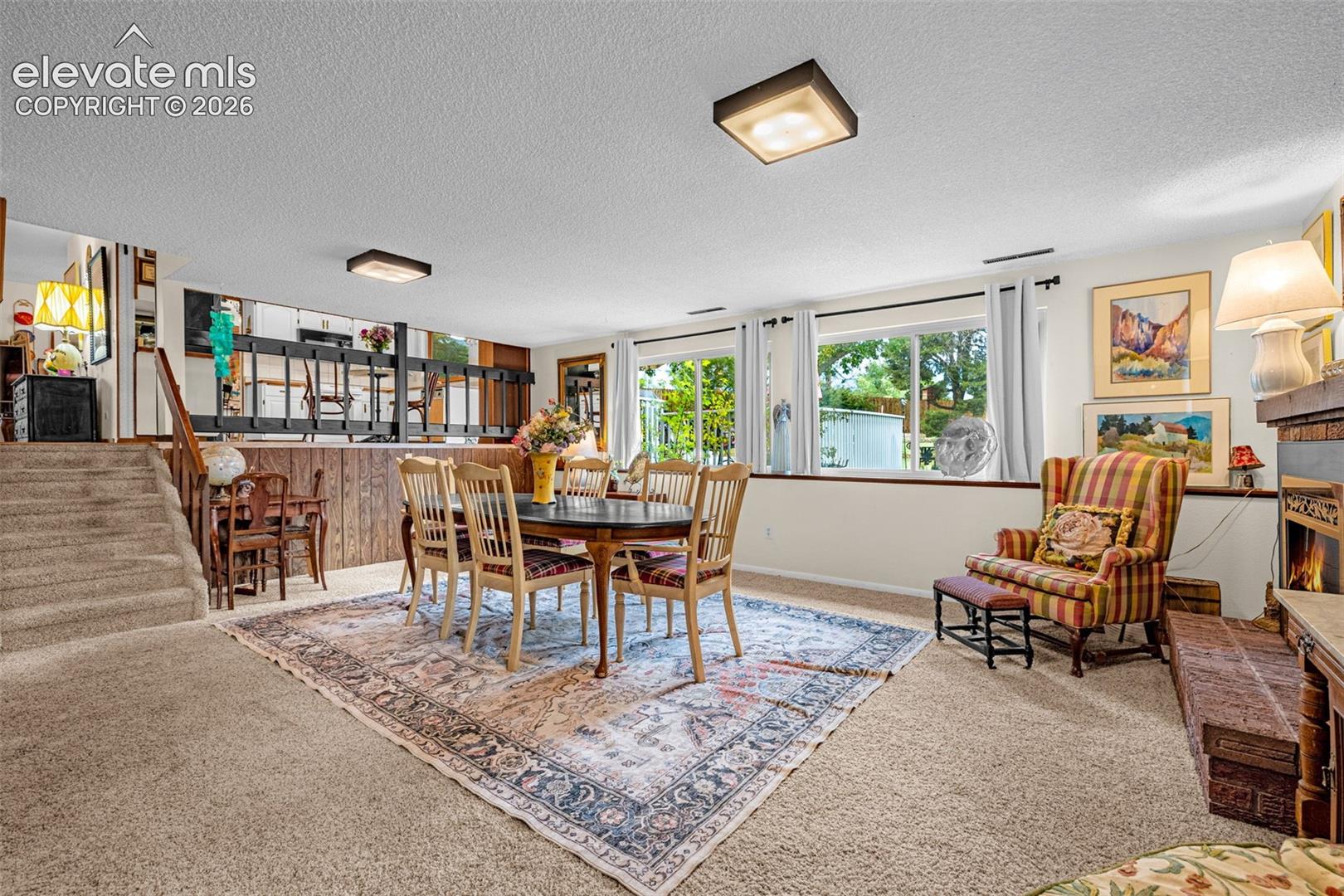 Flexible Living and Dining Space (with furniture) -Lower Level